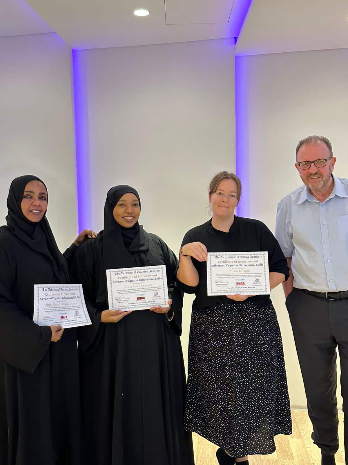 Dr John Crimmins with participants following professional training