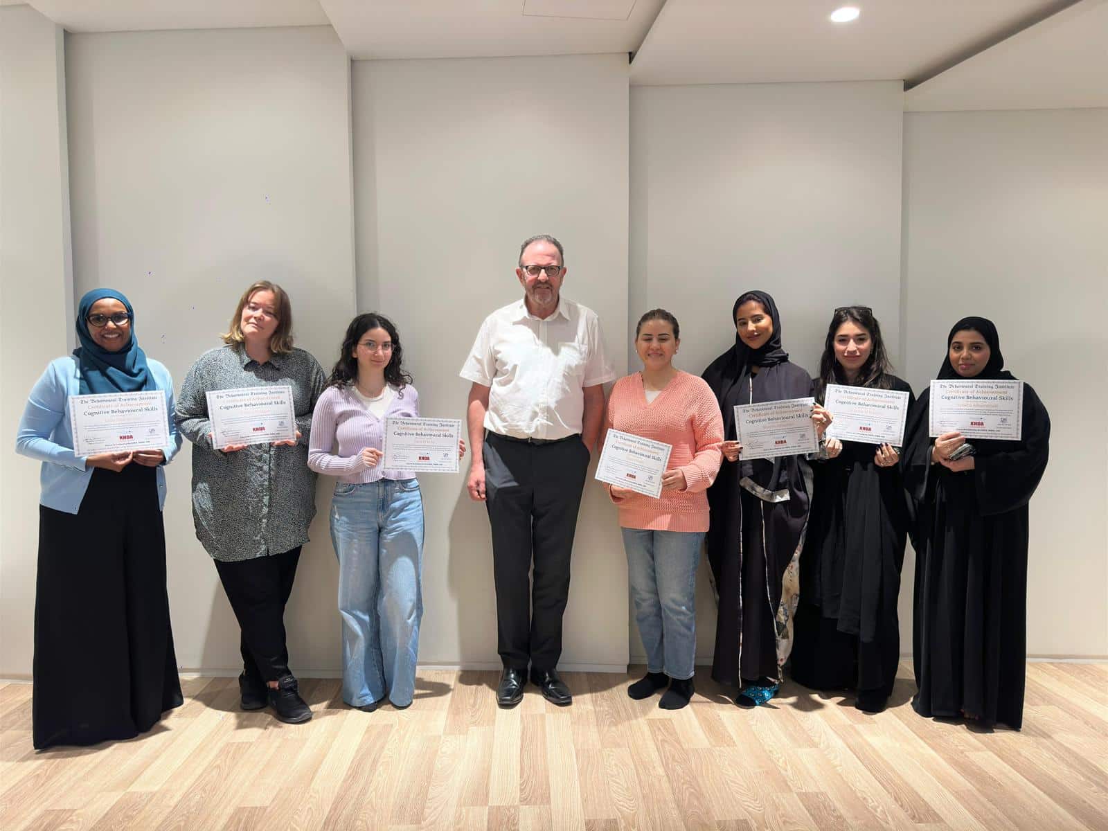 Dr John Crimmins with participants following professional CBT training